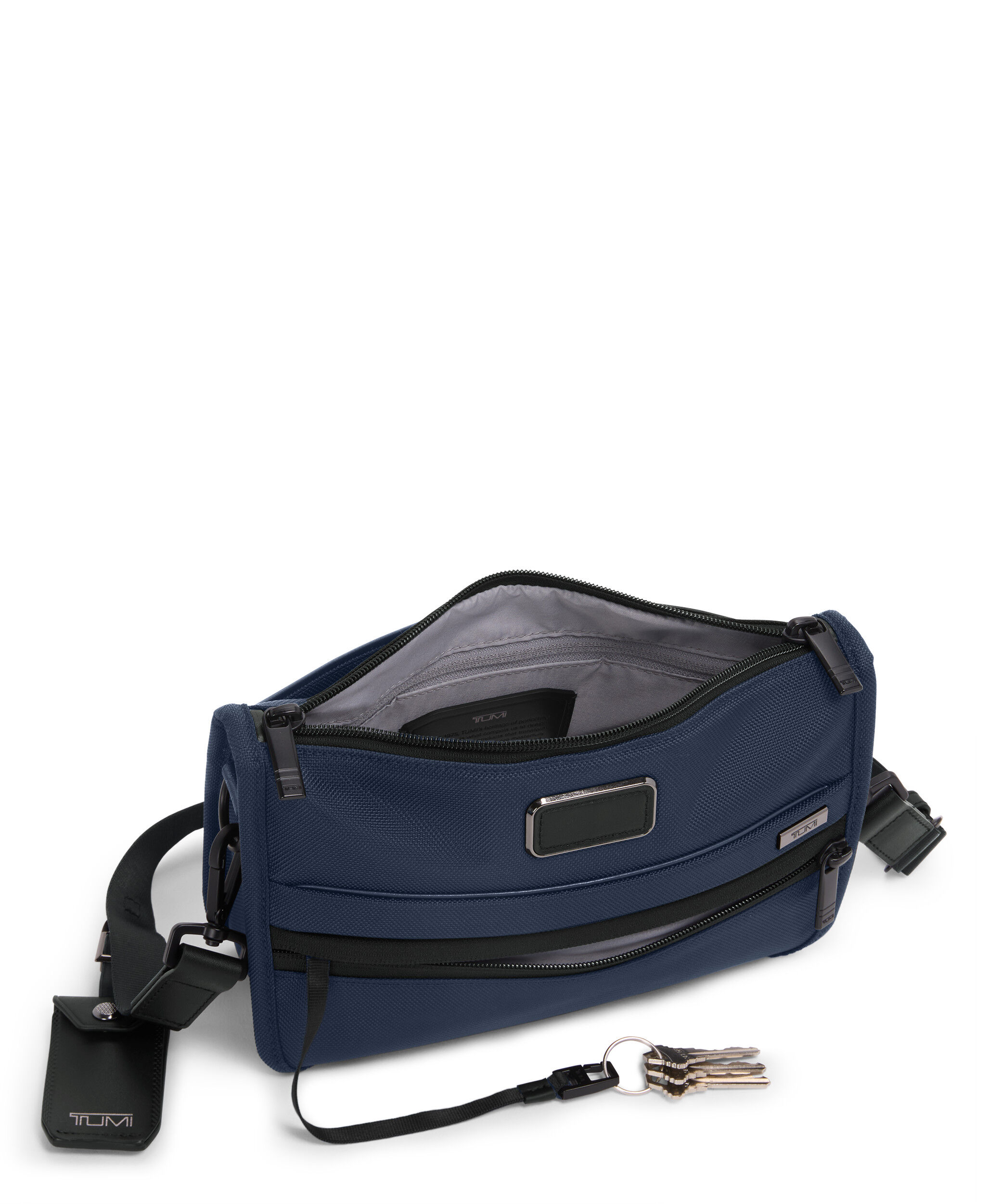 Alpha Crossbody bag - The box | TUMI Convertible Clutch Crossbody